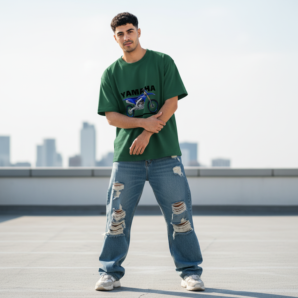 Male model front pose - arms crossed rooftop - Yamaha YZ250 bottle green tee