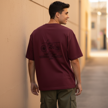 Male model back pose - wall lean golden hour - Yamaha YZ250 maroon tee