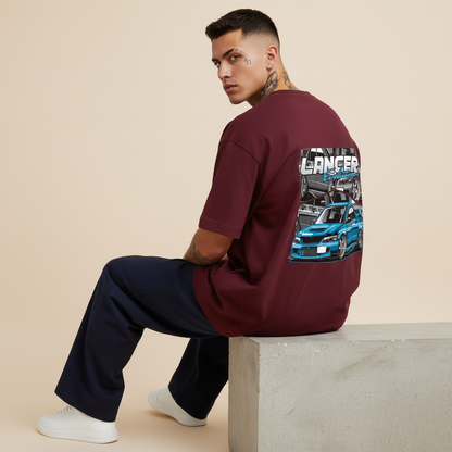 S1 - Model sitting on ledge looking over shoulder with Lancer Evo back print