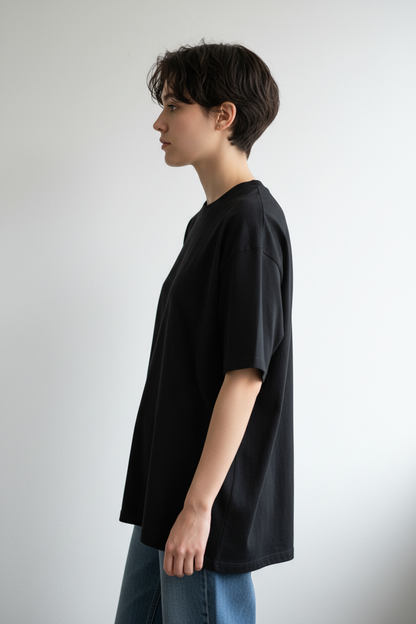 Person wearing Black T-Shirt - Side View