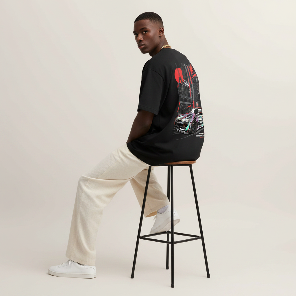 S1 - Model sitting on bar stool looking over shoulder with Nissan GTR back print