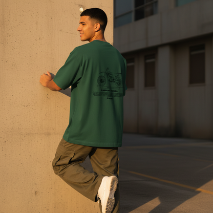 Male model back pose - wall lean golden hour - Yamaha YZ250 bottle green tee