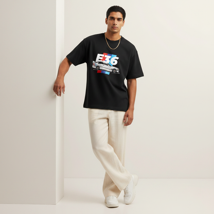 S1 - Model leaning on wall front facing with BMW E36 front print